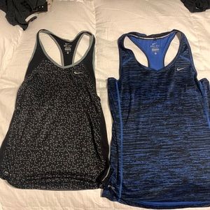 Pair of Nike tops